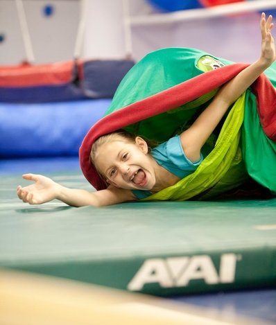 Child playing in gym and happy during treatment